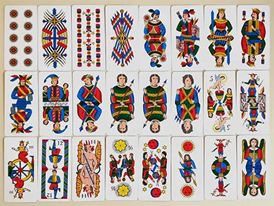 An antique Tarocco Bolognese card displaying generic secular Moors figures instead of traditional religious icons.